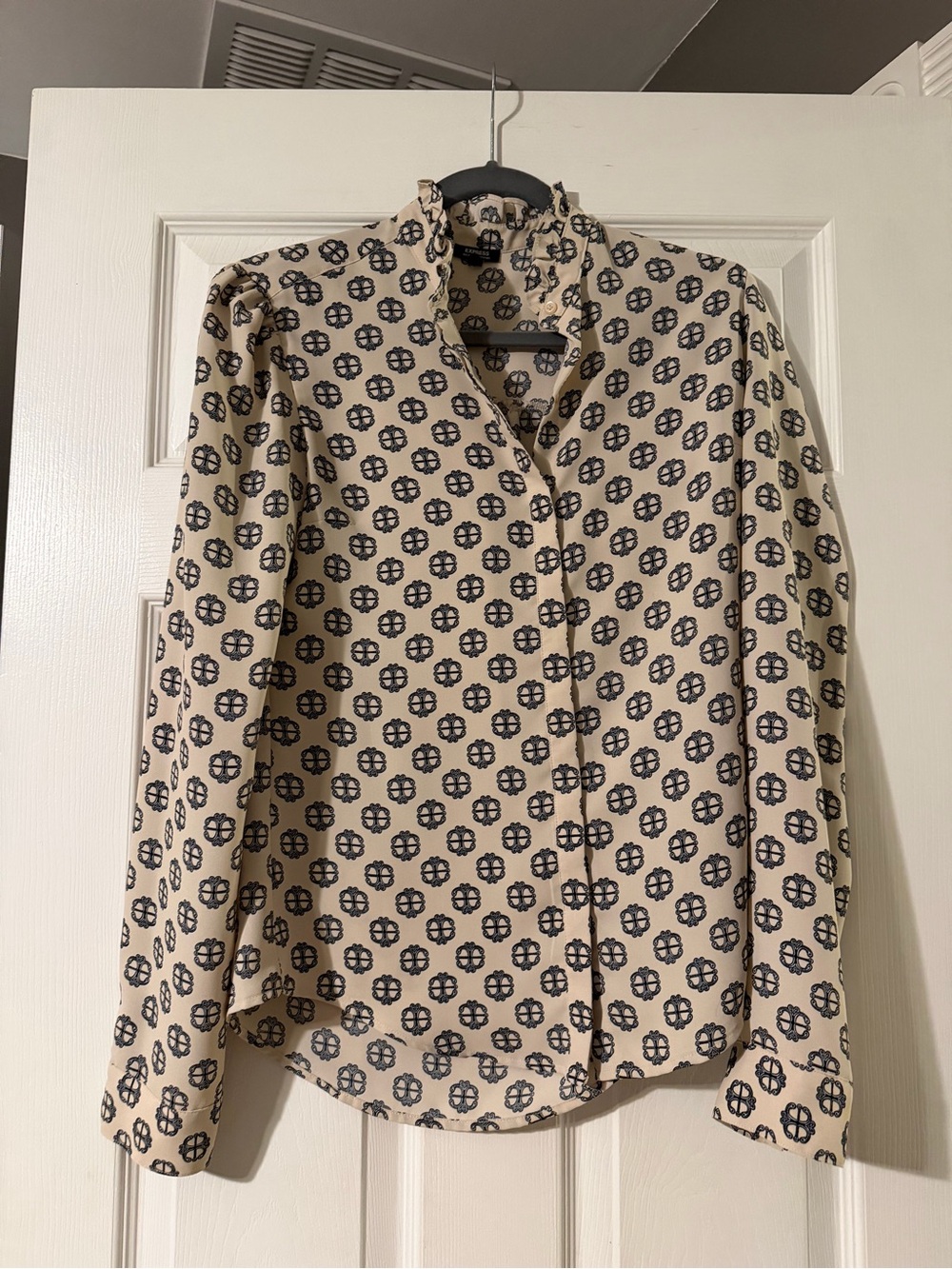 Express Cream Blouse with Navy Medallion Print never worn